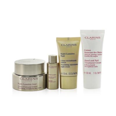 Clarins Nutri-Lumiere Collection: 4pcs+1bag